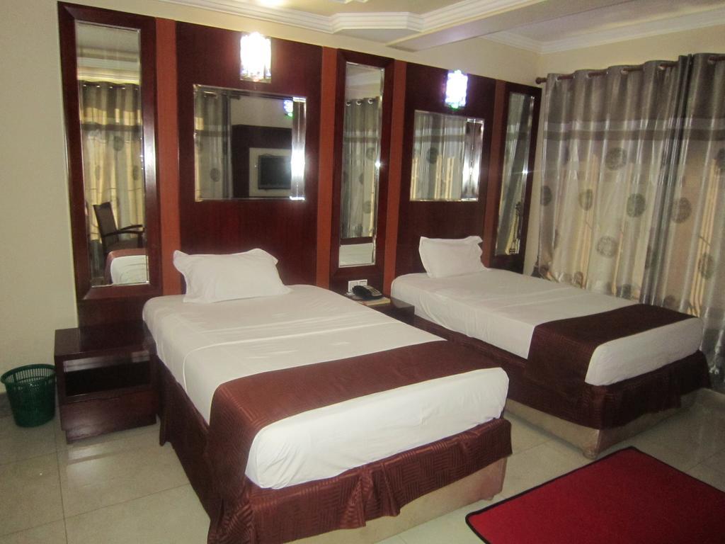 Donsuite Hotel Dar es Salaam Quarto foto
